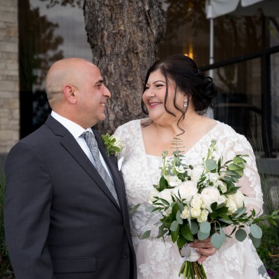 bride and groom gazing at one another